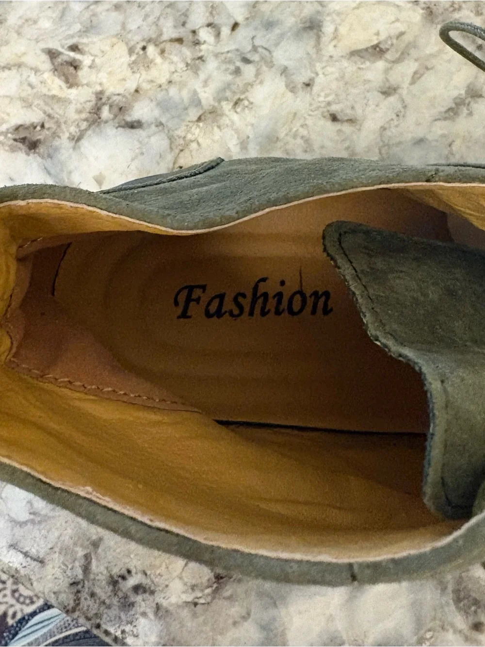 Mew Men’s olive green suede wingtip lace-up ankle boots.
